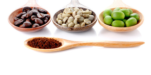 Fresh coffee,roasted coffee,Ground coffee,woden spoon on white b