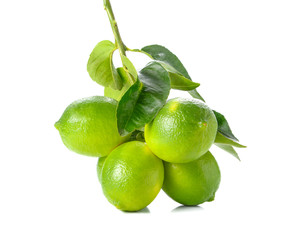 Green lemon,leaves on white background.