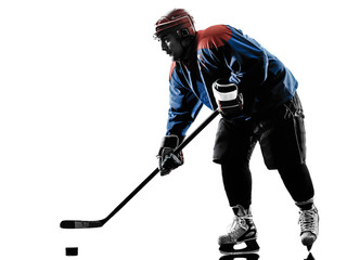 Obraz premium Ice hockey man player silhouette