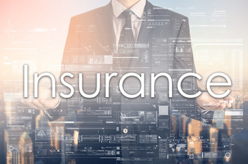 Businessman is presenting text: Insurance