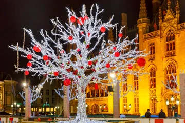 Fotobehang Christmas Market Place at Bruges, Belgium © Kavalenkava
