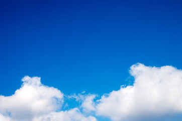 White clouds in blue sky.