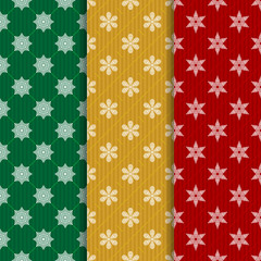 The set of Christmas seamless patterns with snowflakes