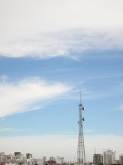 Obraz premium Telecommunication Radio Antenna and Satelite Tower with blue sky