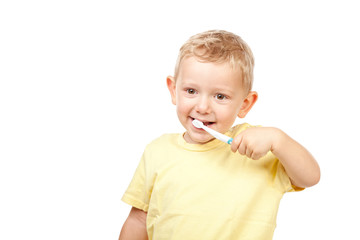 child brushing teeth