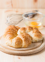 croissant  on wooden plate