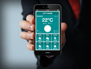 businessman with sudoku game on a smartphone