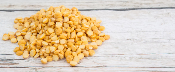 Raw Indian dhal over wooden background