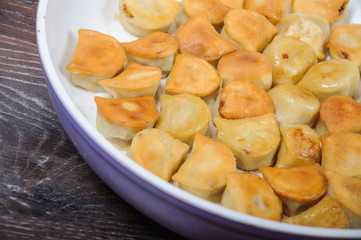 Fried dumplings in the pan