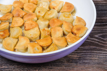 Fried dumplings in the pan