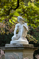 Fototapeta na wymiar Paris - Luxembourg Gardens. Sculpture of Archidamas by Philippe Joseph Henri Lemaire