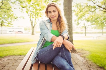 Obraz premium Portrait of smiling woman at park