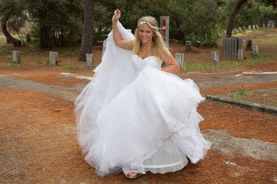 Beautiful and pretty bride with a white wedding dress