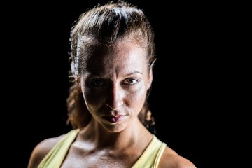 Portrait of confident female athlete 