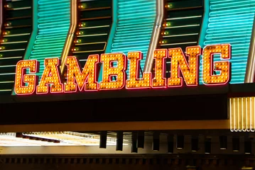 Gordijnen Gambling Sign in Lights. Gambling sign in lights and neon. Las Vegas, Nevada. © Atomazul
