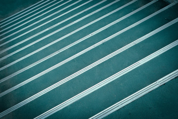 Green plastic carpet stairs