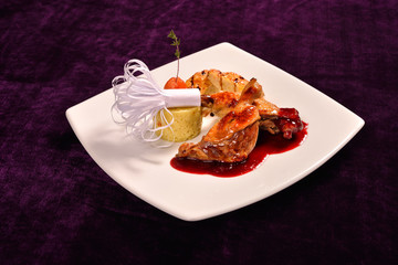 Glazed duck leg, risotto with truffle oil, fig and sauce