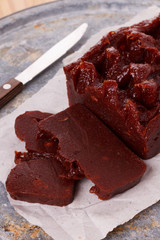 Brazilian dessert goiabada on gray stone tray