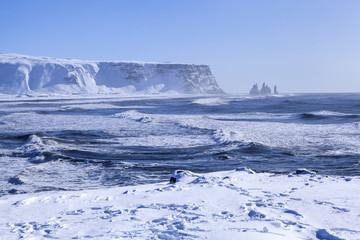 Wide shot of three pinnacles of Vik, South Iceland