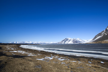 Snow-covered volcanic mountain landscape in Iceland