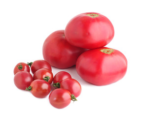 Red small and big tomato on white isolated