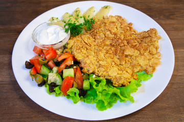 meat casserole with vegetables on a plate