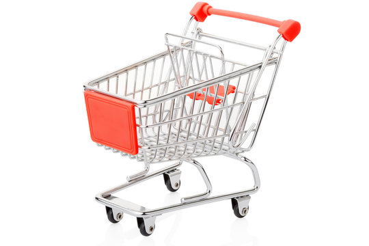 Red shopping cart on white, clipping path included