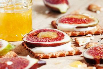 Breakfast with biscuits, homemade yogurt, ripe sweet figs and ho