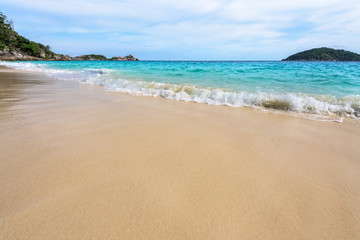 Beautiful landscape blue sea white sand and waves on the beach during summer at Koh Miang island in Mu Ko Similan National Park, Phang Nga province, Thailand