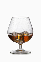 Glass. Whiskey with ice in glass isolated on white background