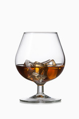 Glass. Whiskey with ice in glass isolated on white background