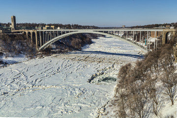 Rainbow Bridge with the river frozen over, taken from the US side.