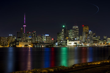 Toronto skyline at night, taken from a local pier.
