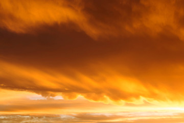 sunset sky with golden clouds