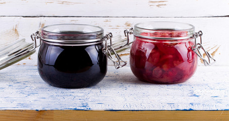 Jam from a pear and currant on a table