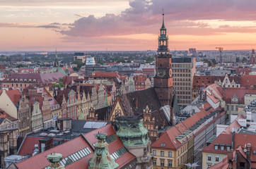 Naklejka na ściany i meble Old city of Wroclaw with Town hall seen from church tower on colorful sunset