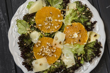 Salad with orange pine nuts and parmesan cheese from Jamie Oliver   