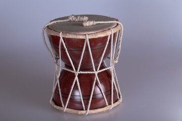 Fototapeta na wymiar A small souvenir and traditional Indian drum.