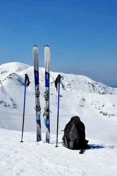 Skis, ski poles and backpack in Tatra mountains