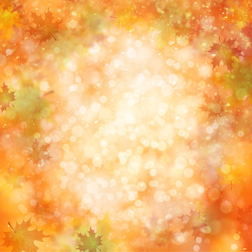 Colorful autumn season blurred leaves on blurry bright orange red bokeh background. Autumn season illustration with copyspace background.