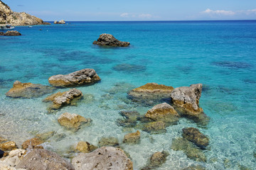 Rock in the water of Agios Nikitas Beach, Lefkada, Ionian Islands, Greece