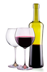 Elegant red wine glass and bottle isolated