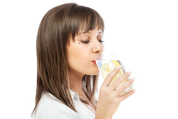 Woman drinking water with lemon
