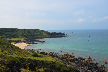Naklejka premium coastline with rocky, blue water. Beautiful sea landscape