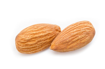 Obraz na płótnie Canvas Close up almonds isolated on the white