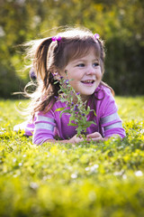 portrait of a little girl in the park