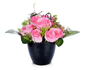 Colorful artificial flower on white background