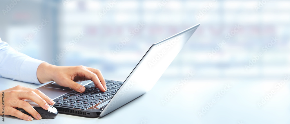 Aufkleber hands typing on computer laptop.