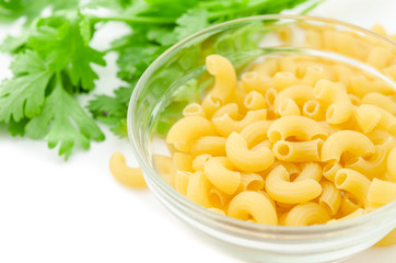 Raw elbos macaroni pasta.