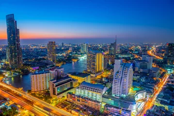 Gordijnen Landscape of river in Bangkok cityscape in night time © CasanoWa Stutio